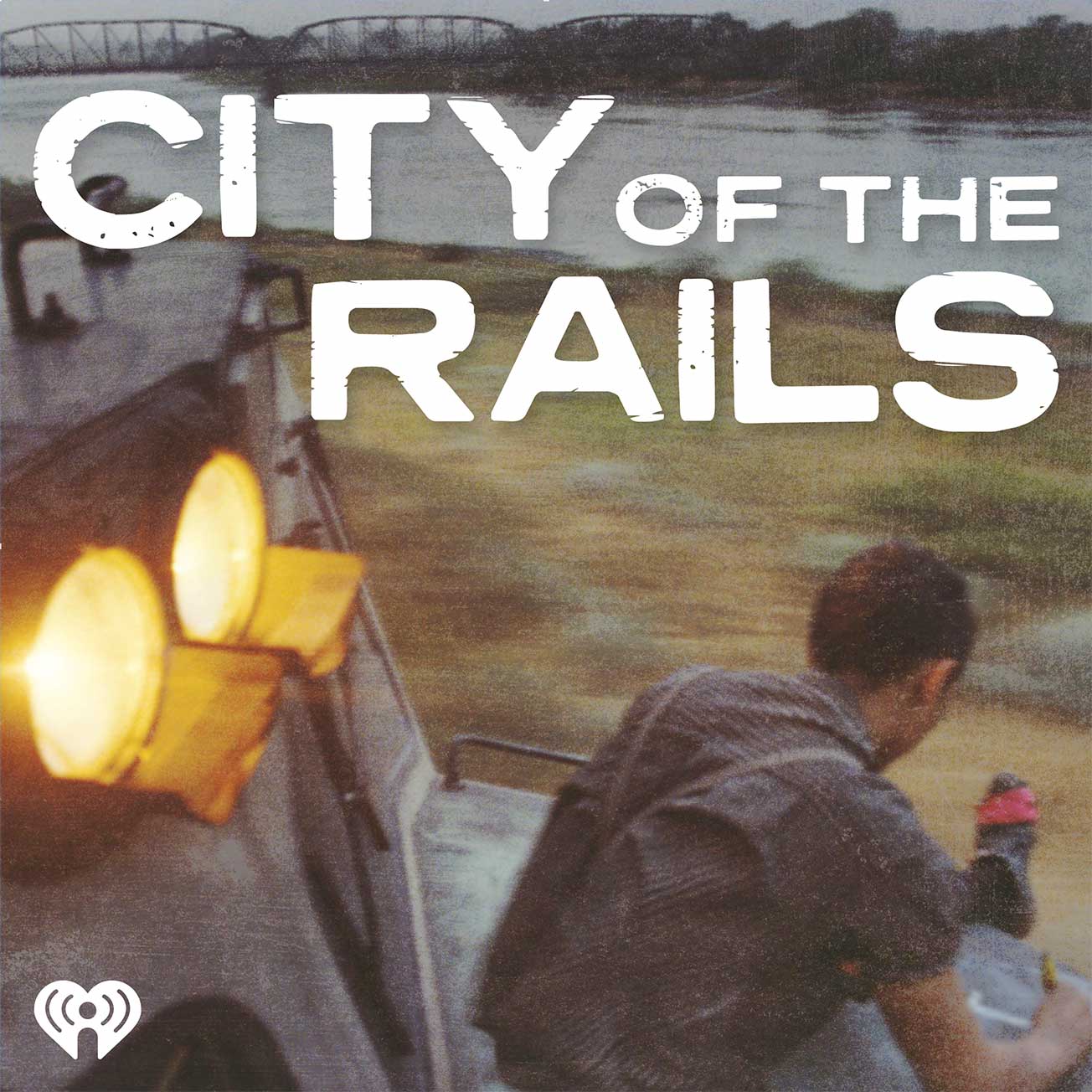 CityOfTheRails-Logo-FINAL1304px Motion shot of a man sitting on the front of a locomotive with the text City of the Rails on top
